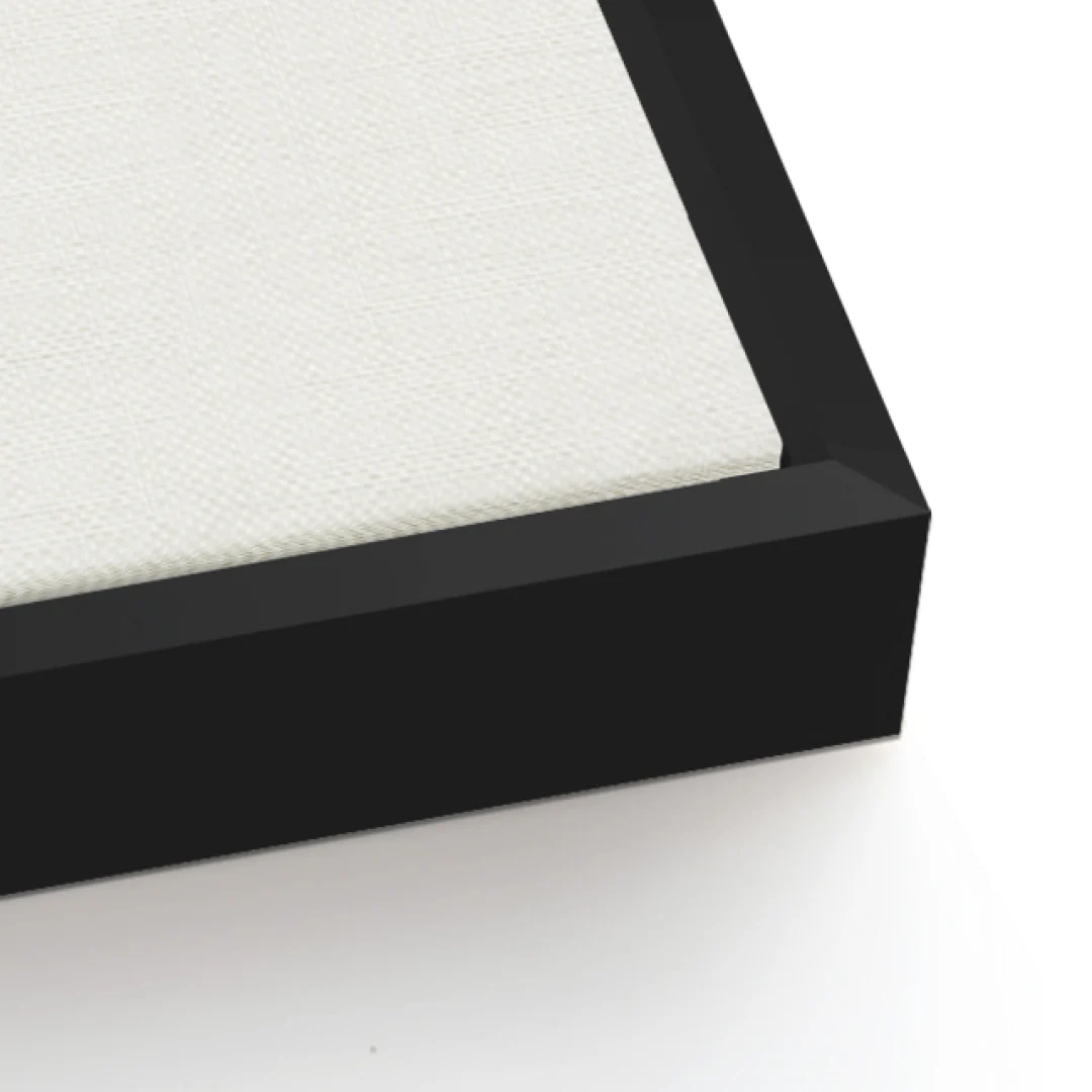 Close-up of a black picture frame corner on a white background