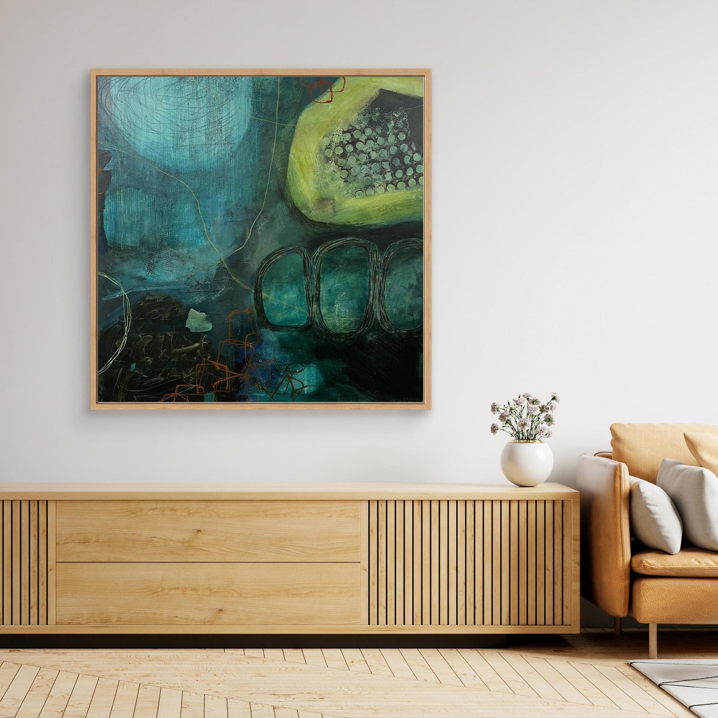 Modern interior with a brown console,  and abstract canvas print 'Behind the Waterfall' on a white wall.