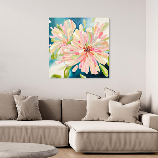 Abstract canvas print 'Bloom Large'on a wall above a sofa in a living room. 