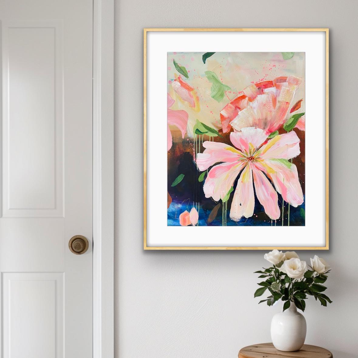Framed floral 'Botanical Dream' Art Print on a wall with a vase of flowers below.
