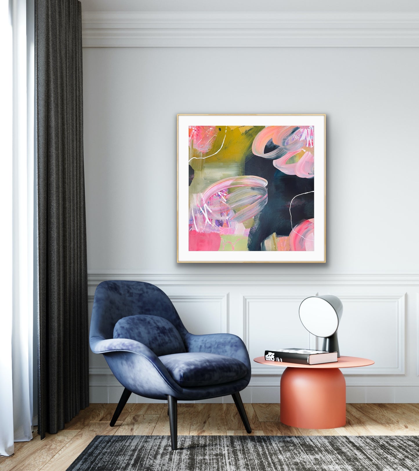 Modern interior with a blue armchair, pink side table, and navy blue and pink abstract art print 'Bubblegum' on the wall.