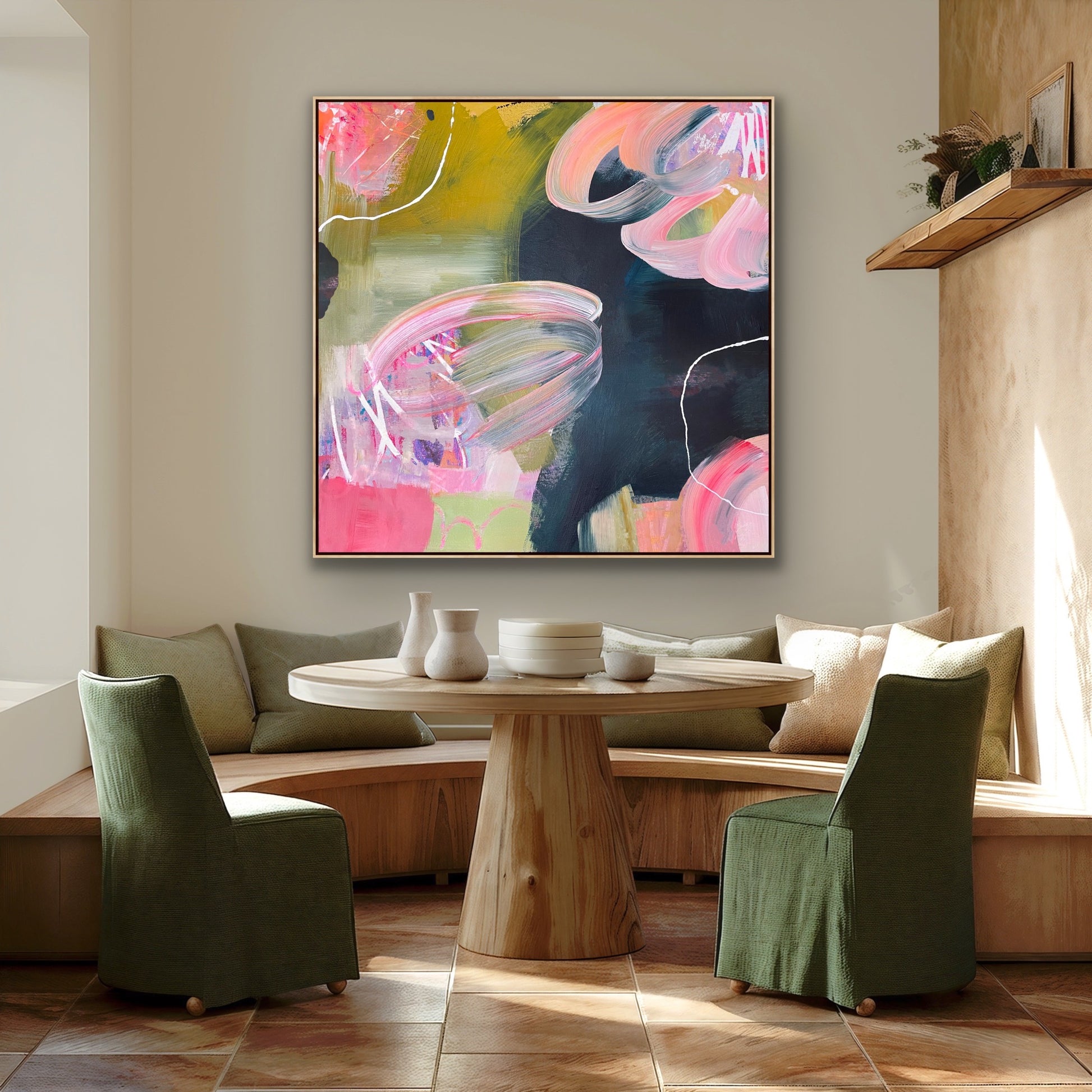 Modern living room with abstract Alison Gilbert canvas print 'Bubblegum', a wooden table, and green chairs.