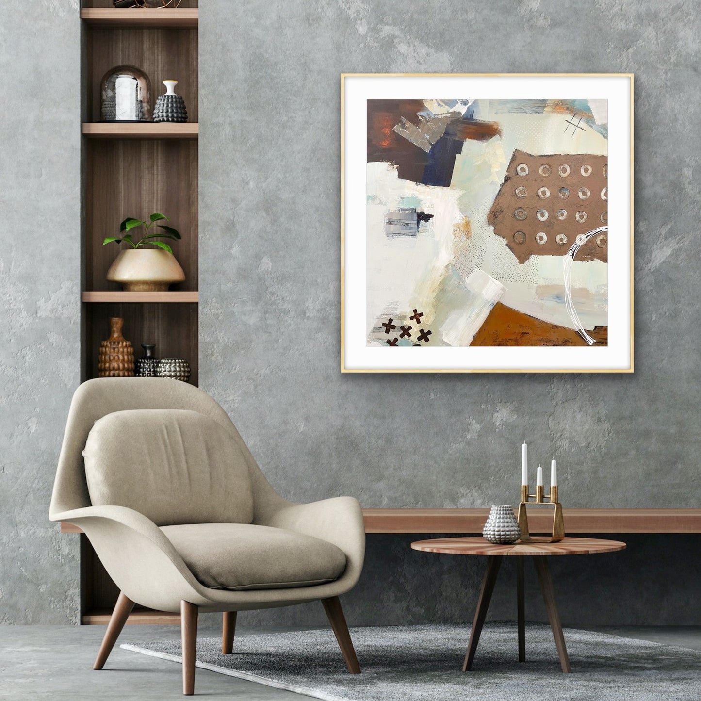 Modern living room with a beige armchair, neutral abstract Giclee Print "Echoes" from Alison Gilbert Art, on the wall, and a small round table.