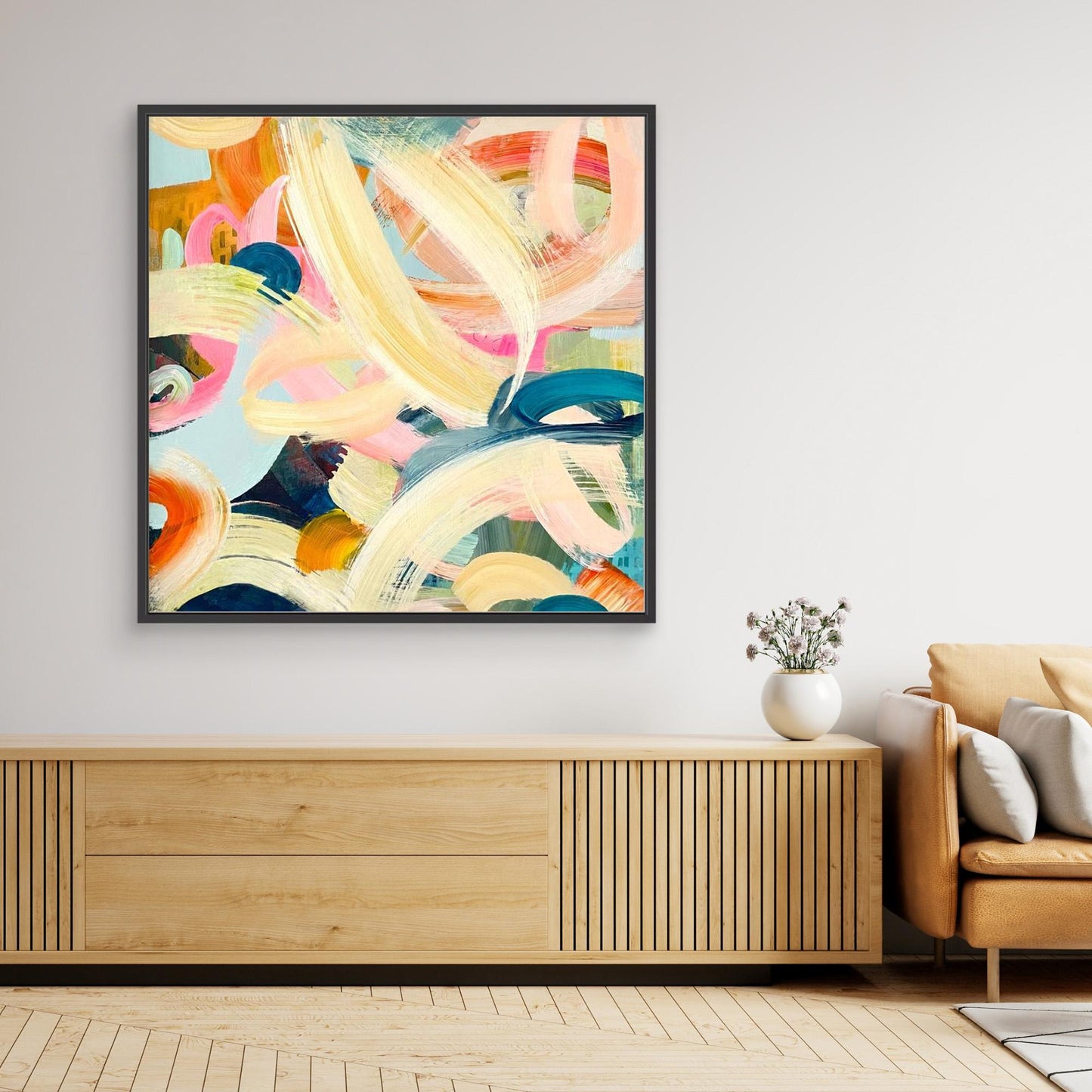 Abstract Alison Gilbert canvas print 'Freewheeling' in a modern living room setting with a wooden cabinet and sofa.