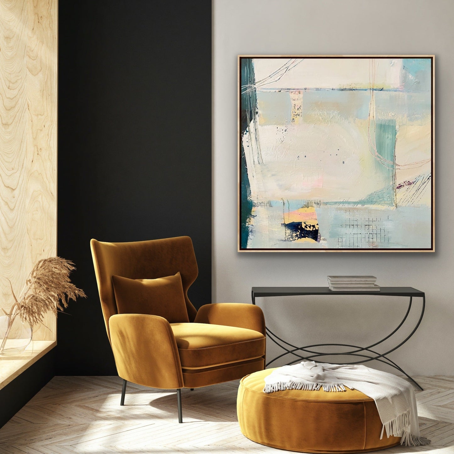 Large abstract canvas print 'Harbour' by Alison Gilbert Art on a wall above a black console table and by a gold velvet chair and footstool