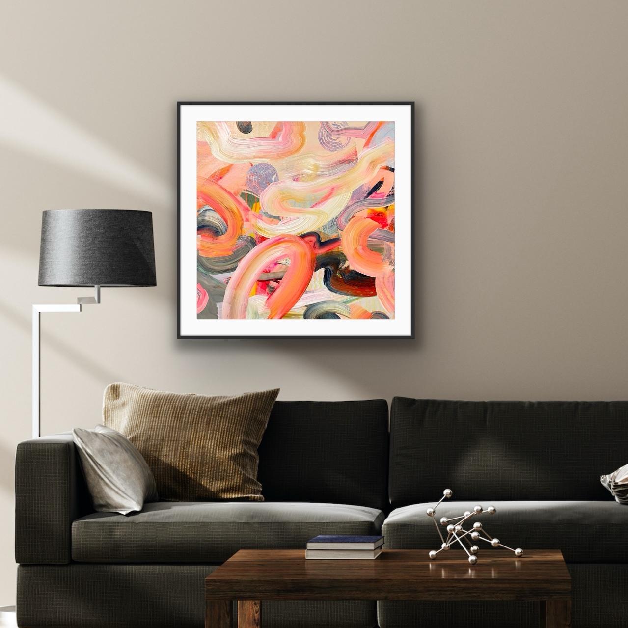 Living room with a dark gray sofa, wooden coffee table, and 'Wurlitzer' Framed Art Print on Paper on the wall.