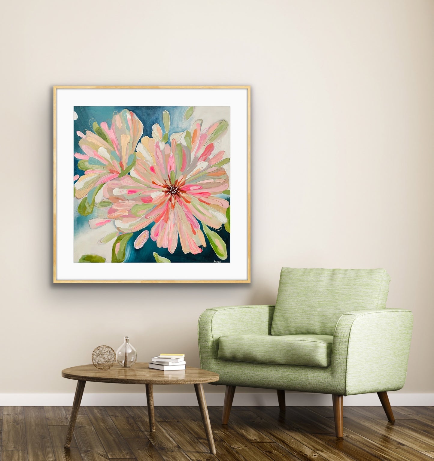 'Bloom Large' Framed Art Print on Paper on a white wall above a green armchair in a living room.