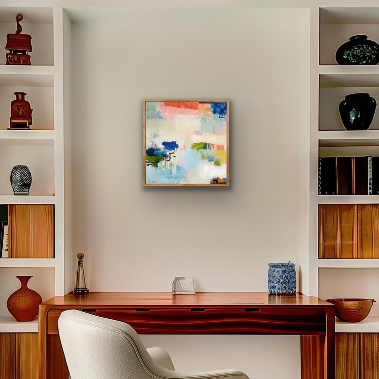 Modern office setup with a desk, chair, and abstract Alison Gilbert canvas print 'Lost in the Moment' on the wall.