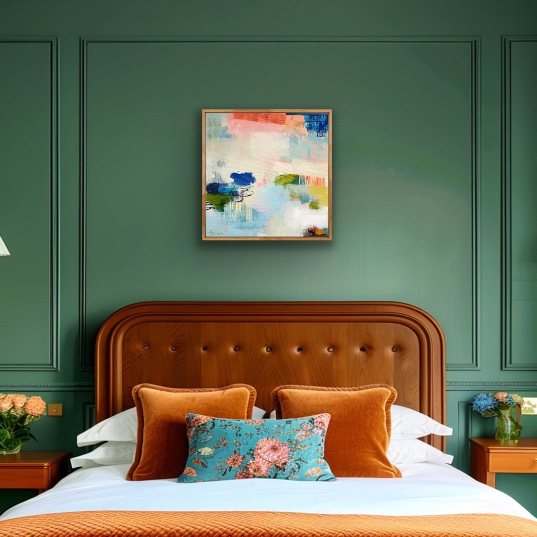 Bedroom with green walls, wooden headboard, decorative pillows, and an abstract print 'Lost in the Moment' by Alison Gilbert Art on the wall.
