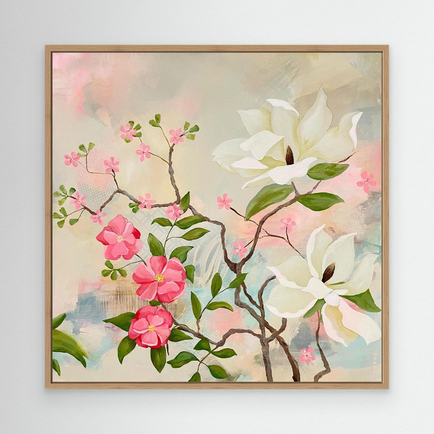 Maytime Magnolias Canvas Art Print in oak frame on white wall