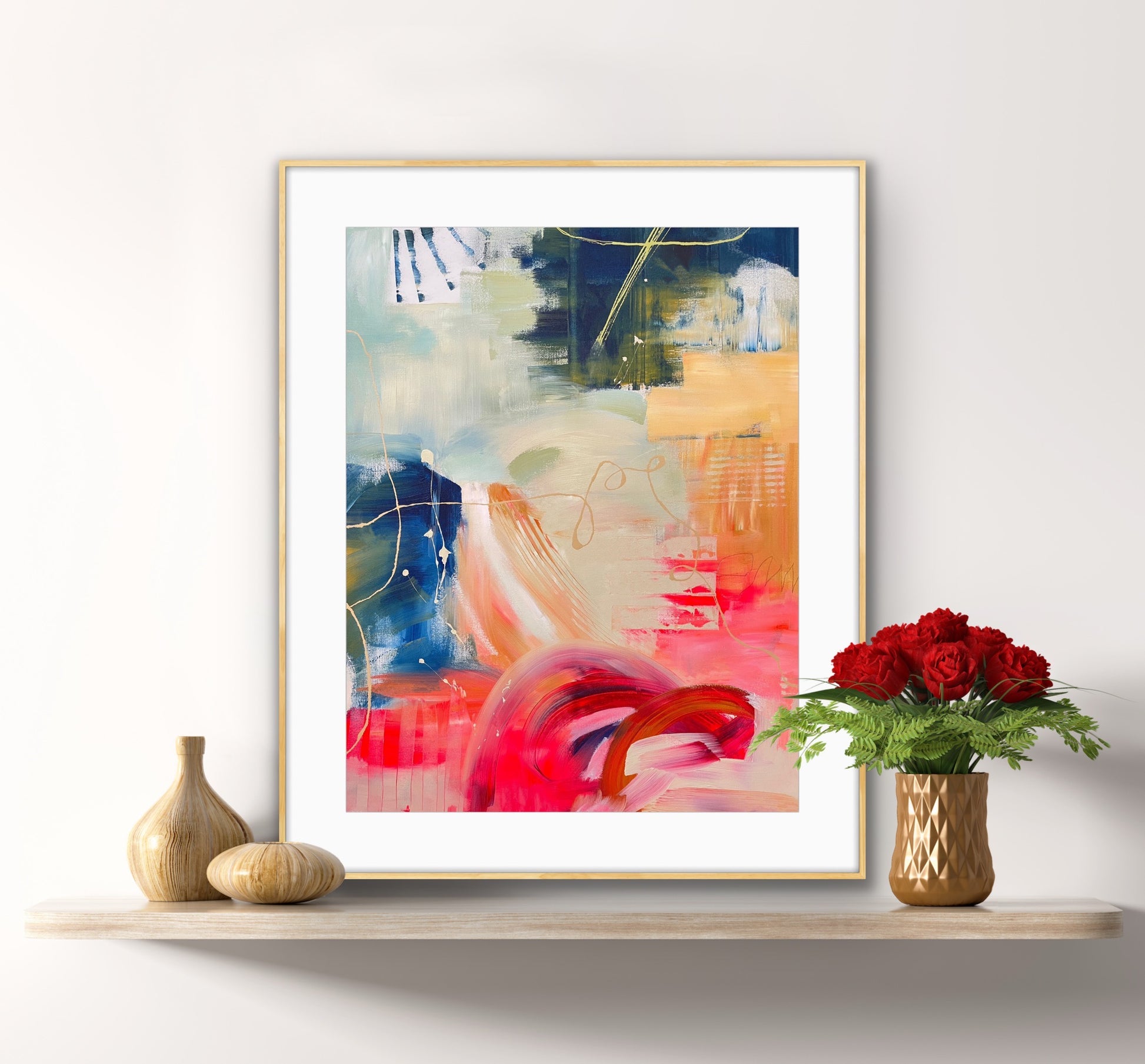 Framed Art Print on Paper 'Red Moon Rising' on a shelf with decorative pots