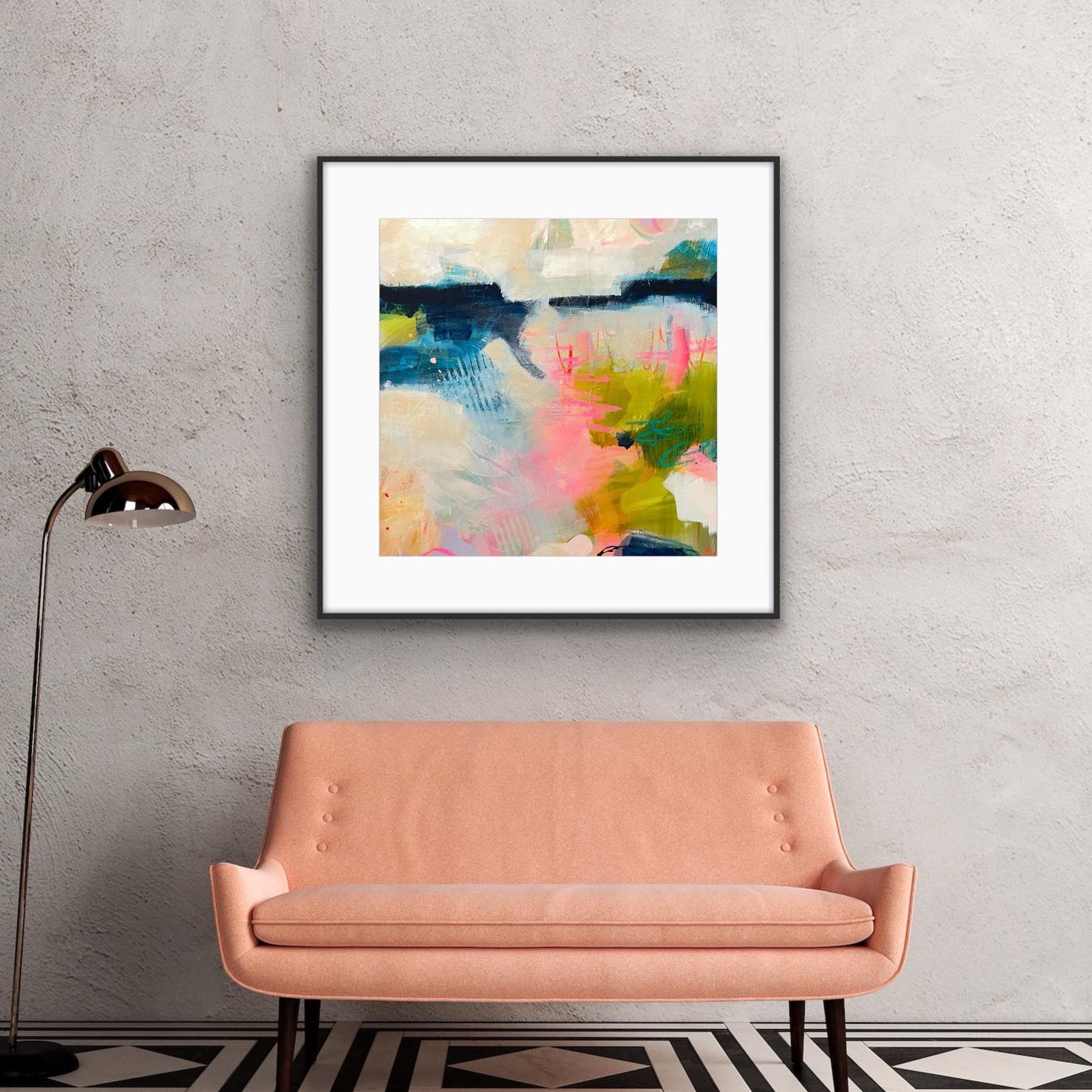 Abstract Framed Art Print 'Shepherd's Delight' on a gray wall above a pink sofa with a floor lamp.