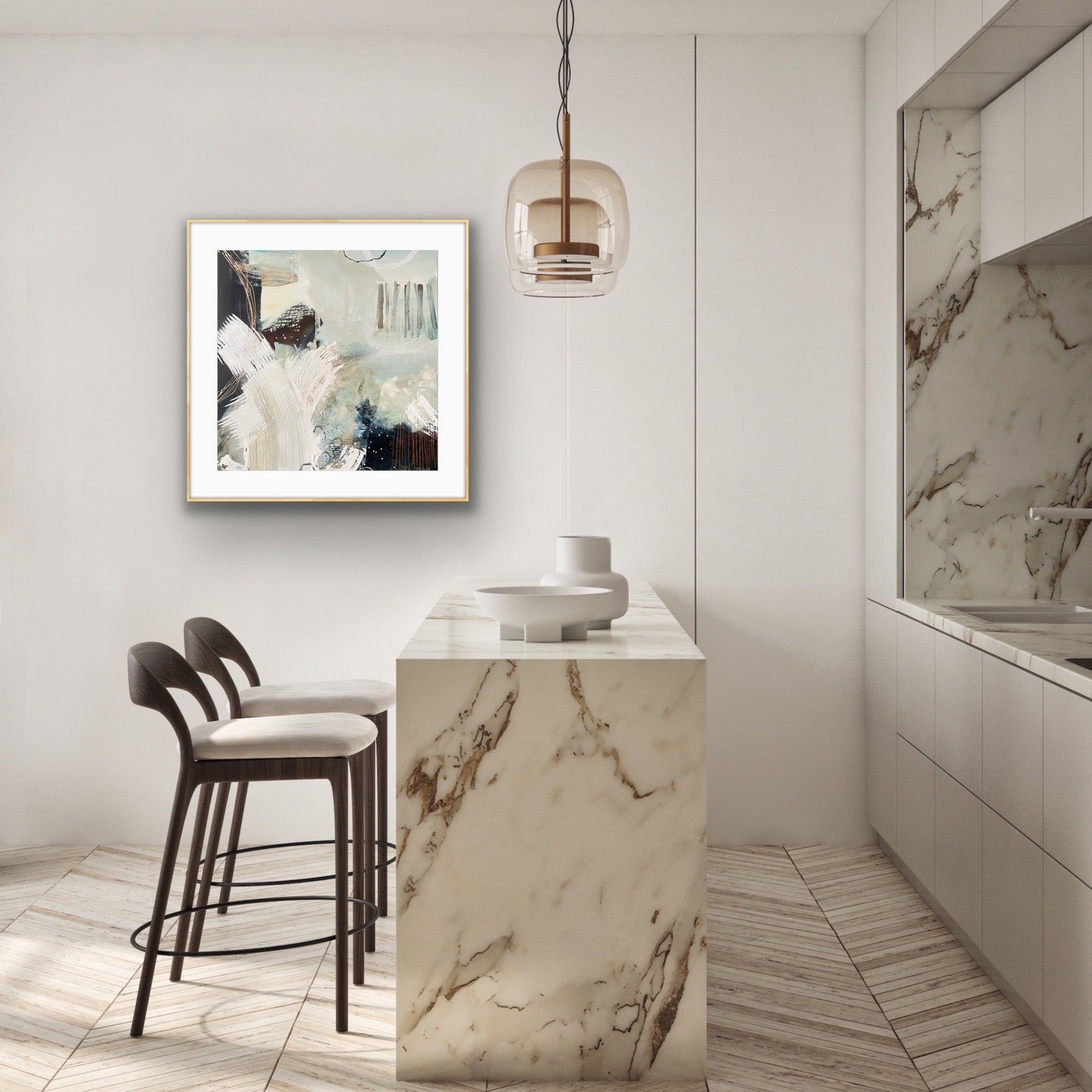Modern kitchen with marble island, stools, and abstract art print "Siren's Swell" by Alison Gilbert Art, on the wall.