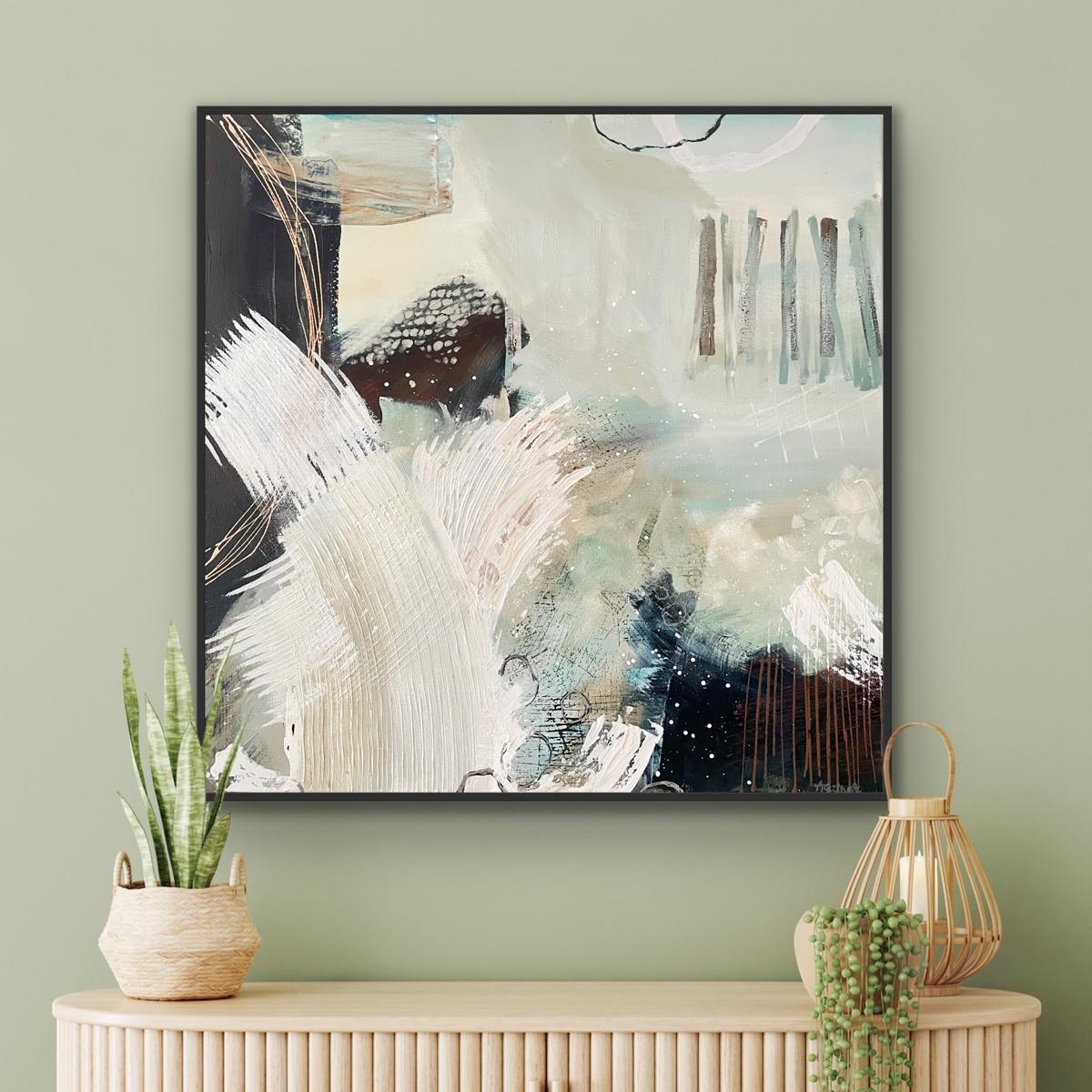 Abstract canvas print 'Siren's Swell' by Alison Gilbert Art on a wall above a wooden console table with decorative items.