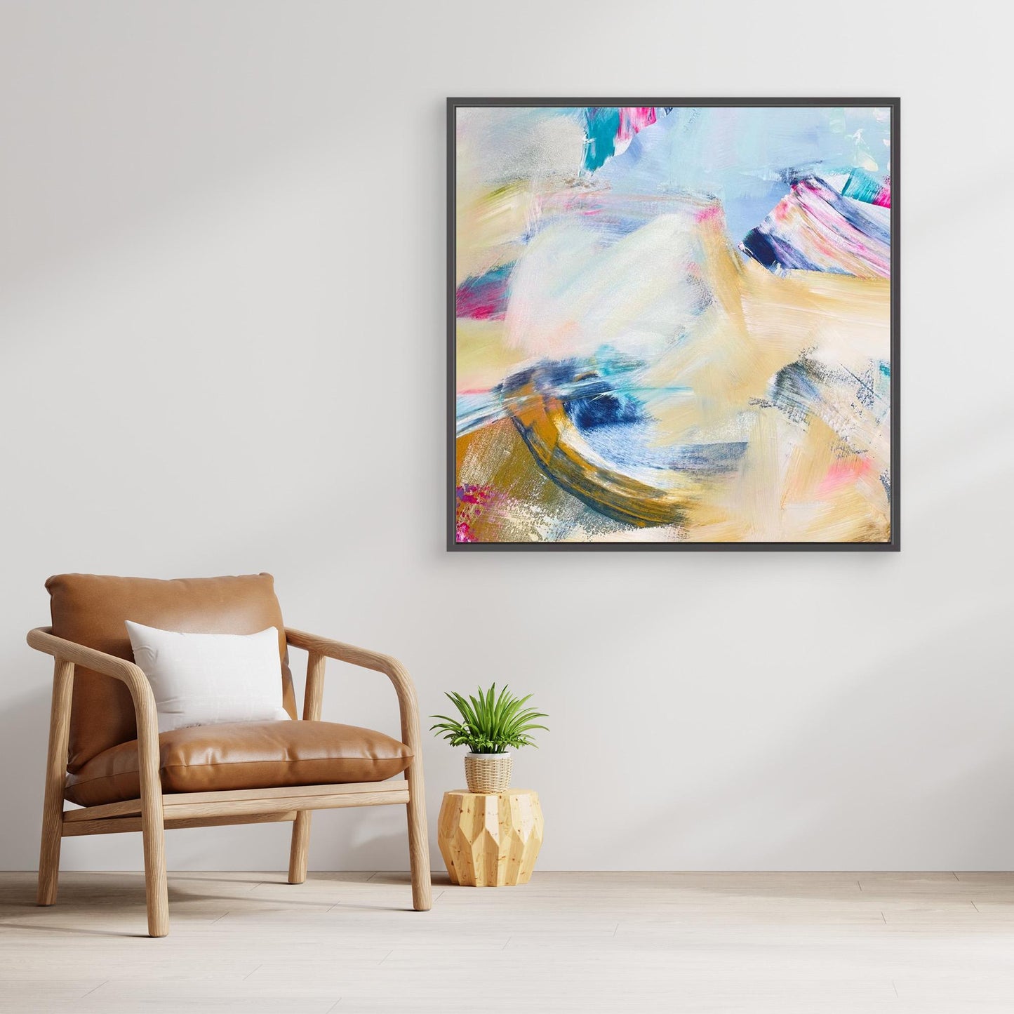 Abstract canvas print 'Summer Breeze' from Alison Gilbert in a modern living room with a brown chair and plant.