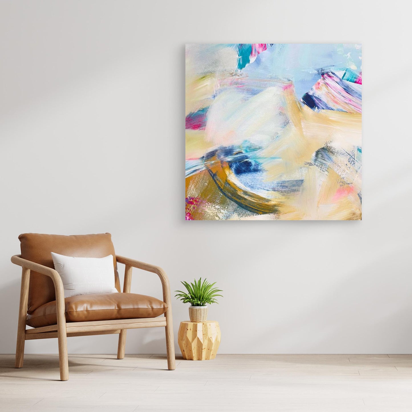 Abstract canvas print 'Summer Breeze' from Alison Gilbert in a modern living room with a brown chair and plant.