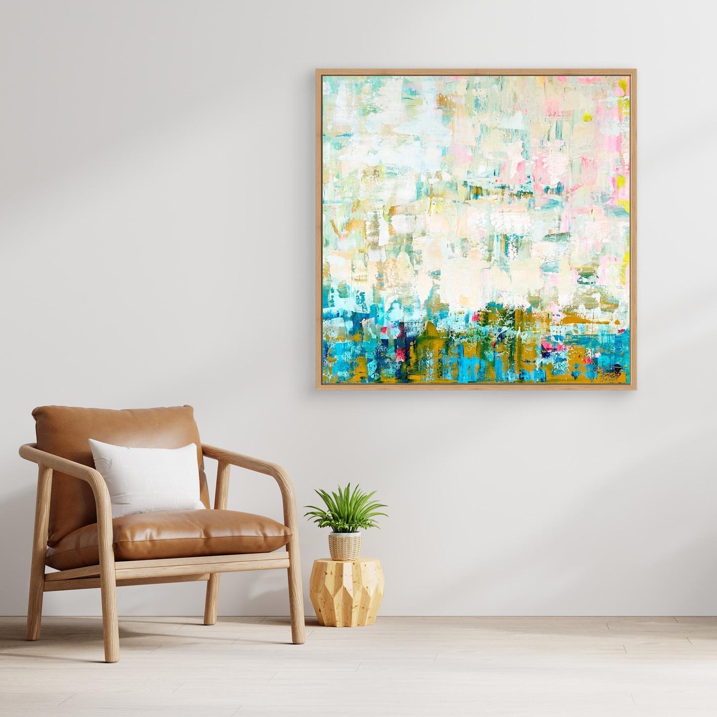 Where the Light Falls abstract canvas print from Alison Gilbert Art and a leather and wood Scandi style chair.