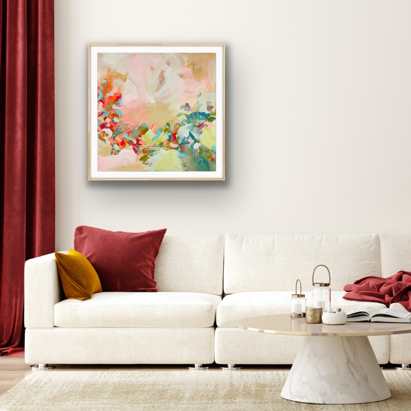 Living room with a white sofa, colorful pillows, and a abstract giclee print "Whispers of a New Day" on the wall.