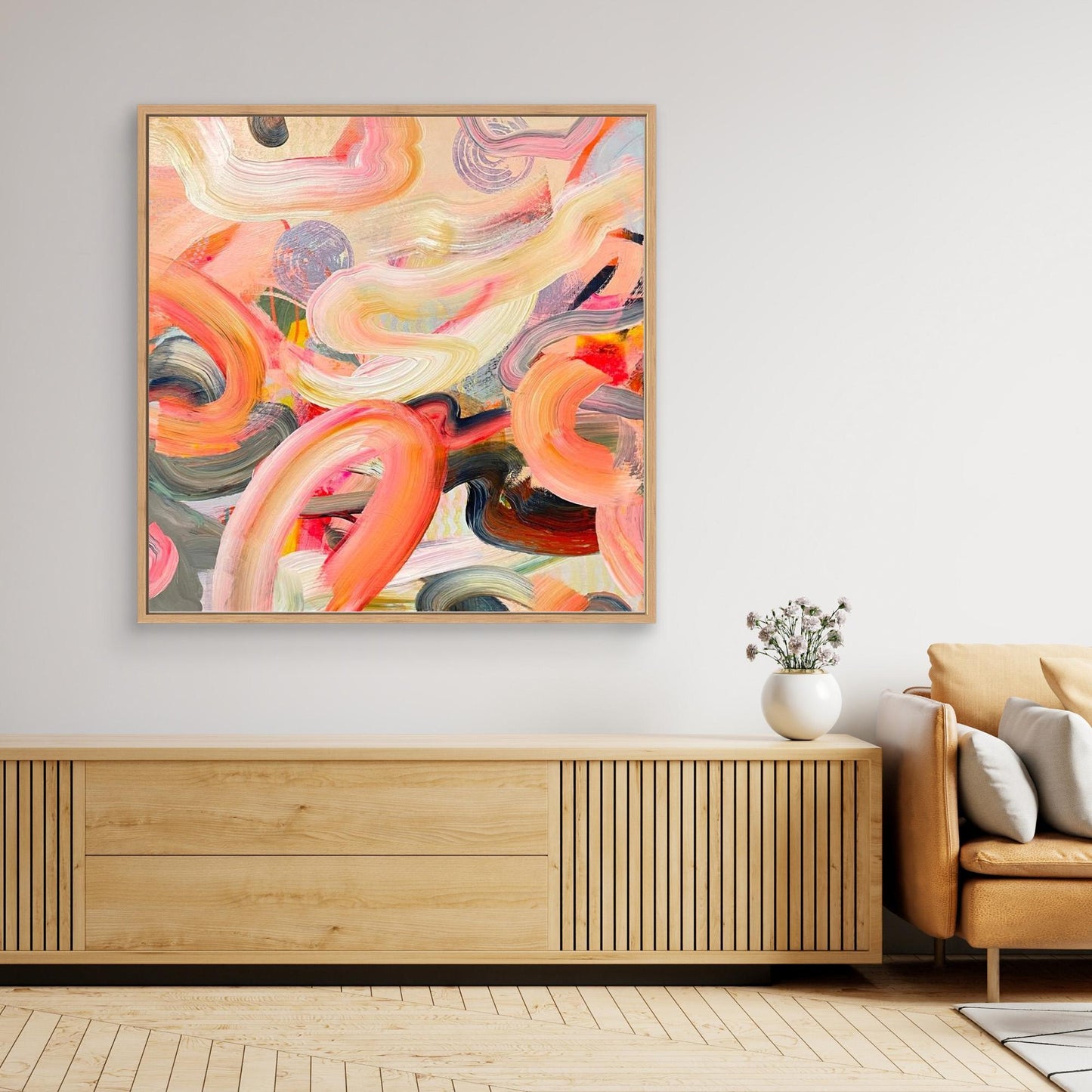 Abstract Alison Gilbert canvas print 'Wurlitzer'  in a modern living room with wooden cabinet and beige sofa.