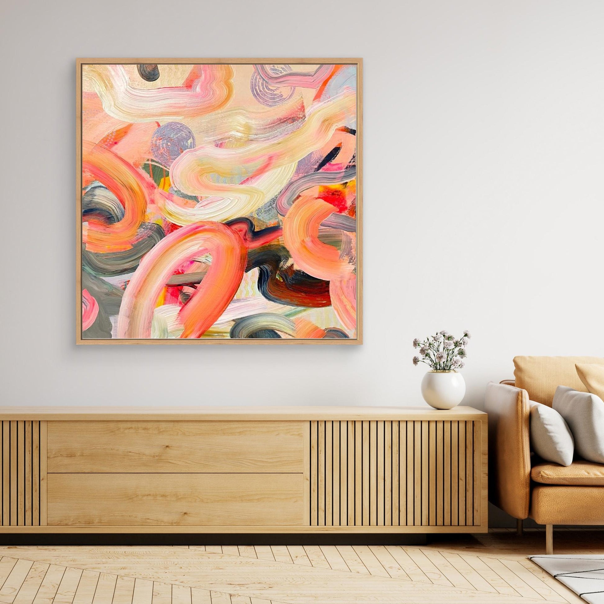 Abstract Alison Gilbert canvas print 'Wurlitzer'  in a modern living room with wooden cabinet and beige sofa.